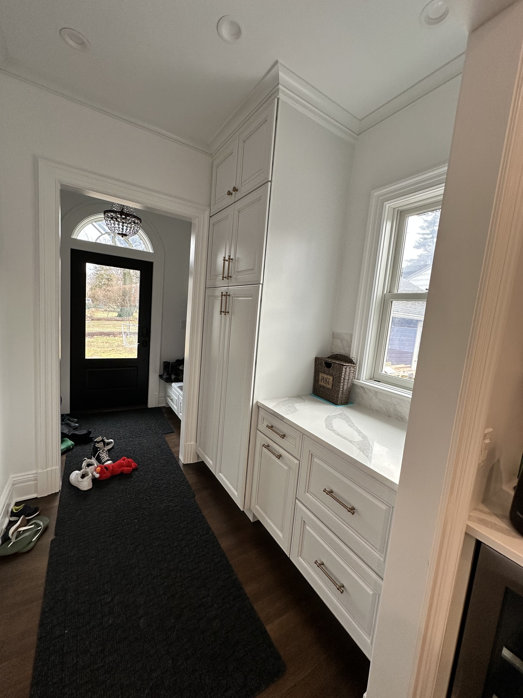 Estate White kitchen by DezzWorks — Mudroom · Installed